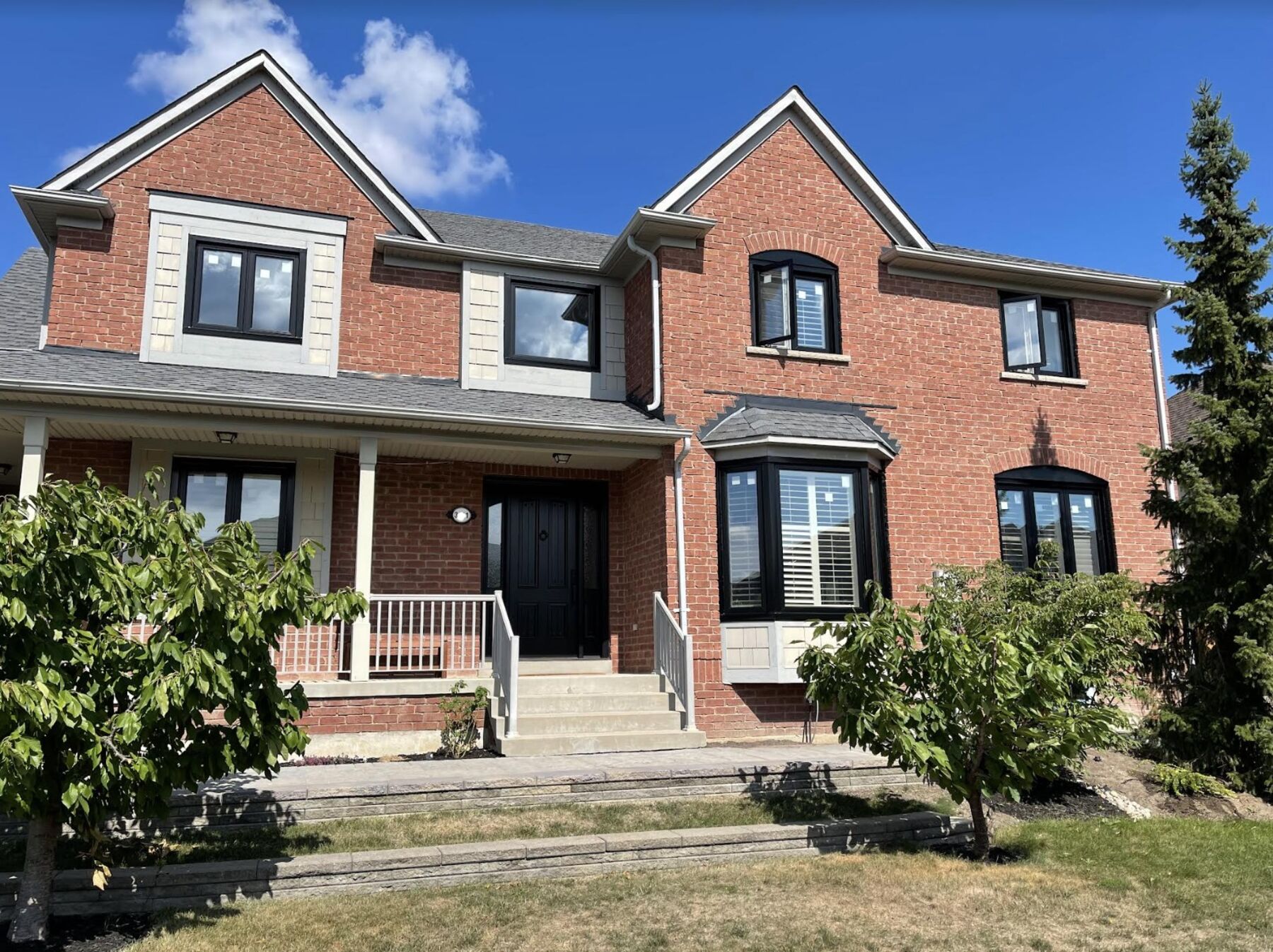 Toronto brick semi-detached home with a replaced front entry door